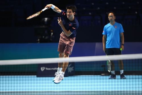 Kei Nishikori (in front) and Michael Chang (behind Nishikori) (Source: Getty)