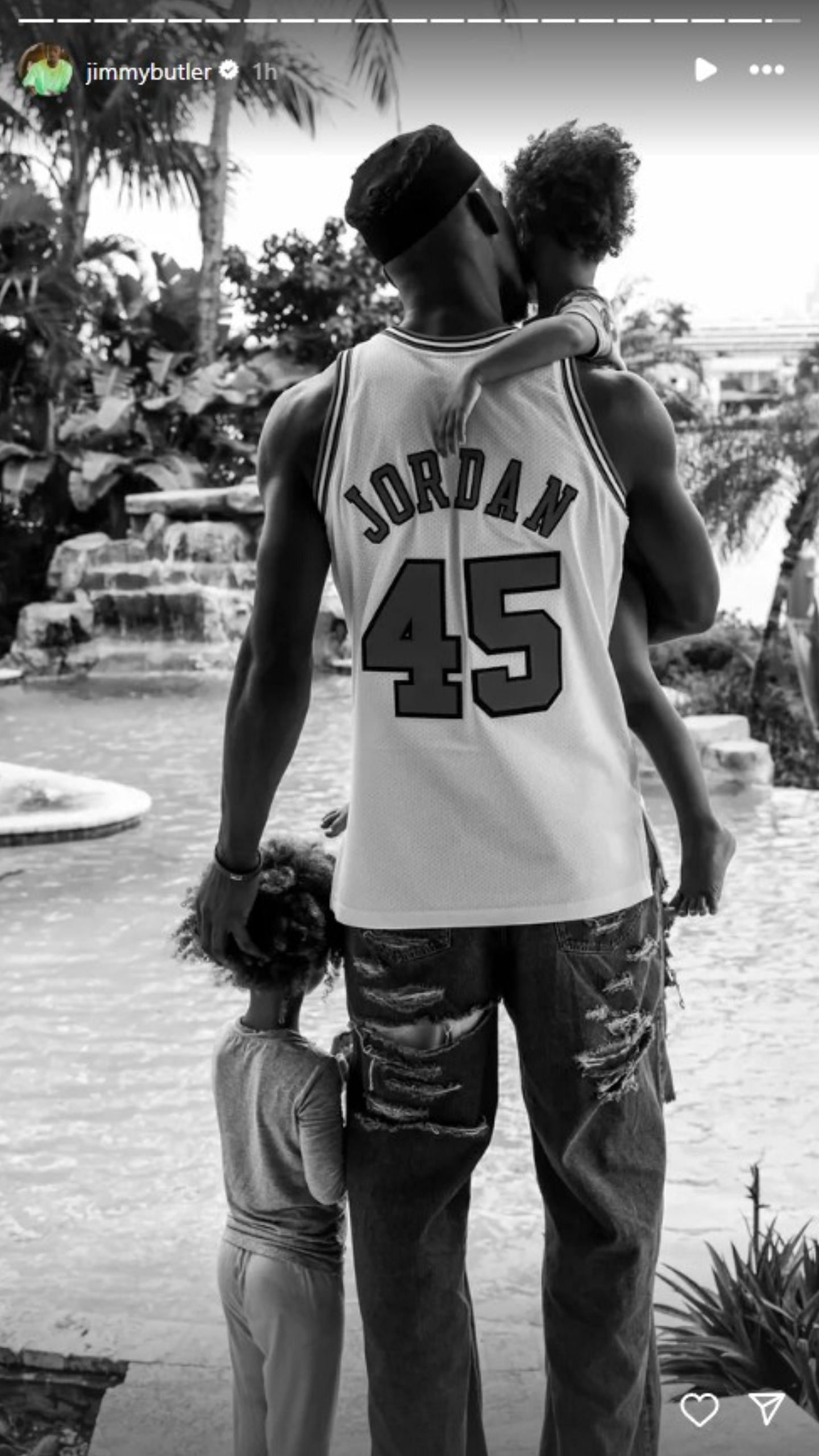 Butler wearing the No. 45 Bulls jersey with his kids (Image Source: @jimmybutler/Instagram)