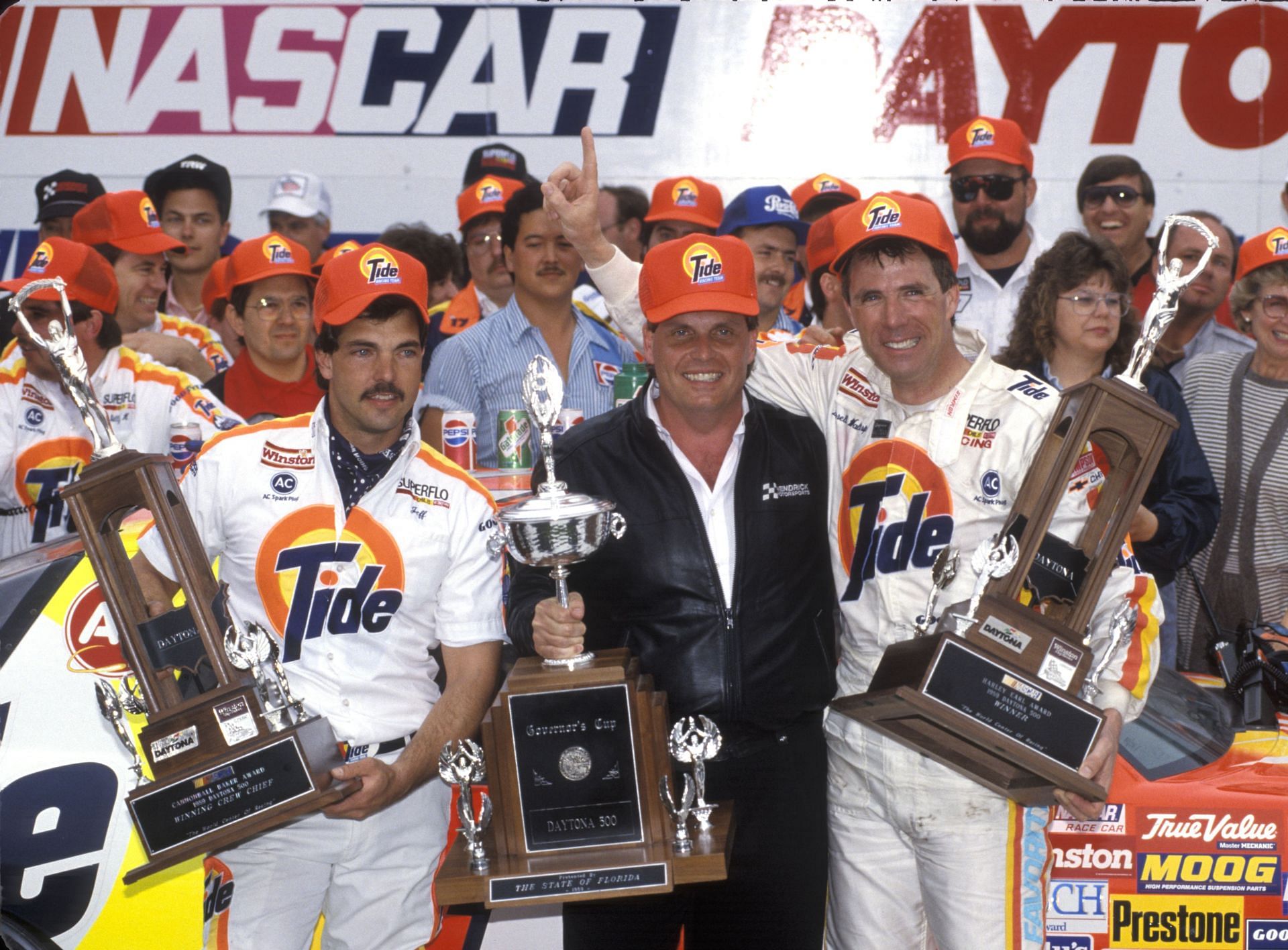 Darrel Waltrip (R) victorious after winning the 1989 Daytona 500 race - Source: Getty