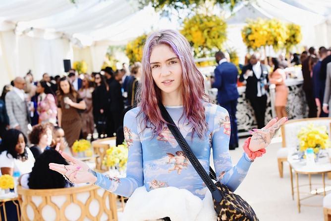 Grimes addresses "super toxic negative things" in her fanbase and clarifies her stance on white supremacy