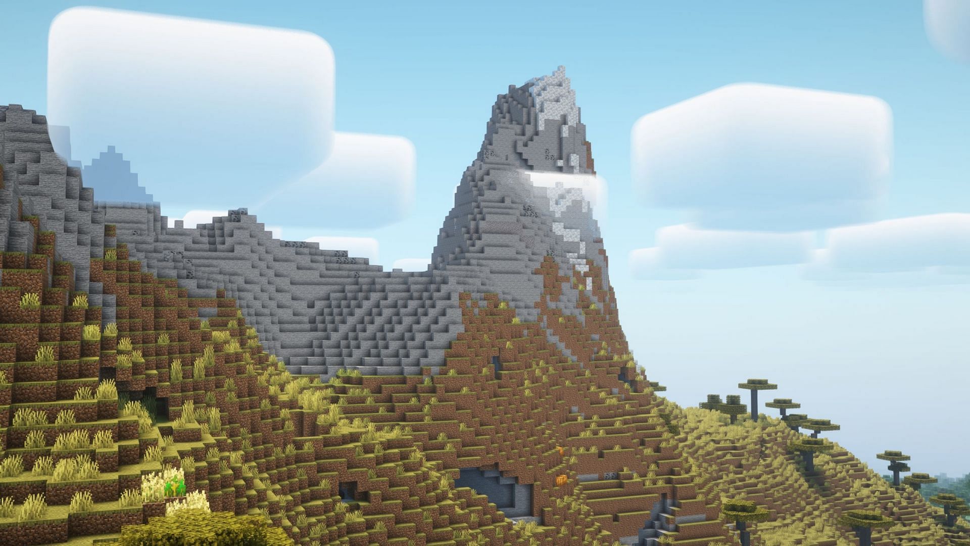 Players can create a castle-like build-up in the Stony Peak mountains (Image via Mojang Studios)