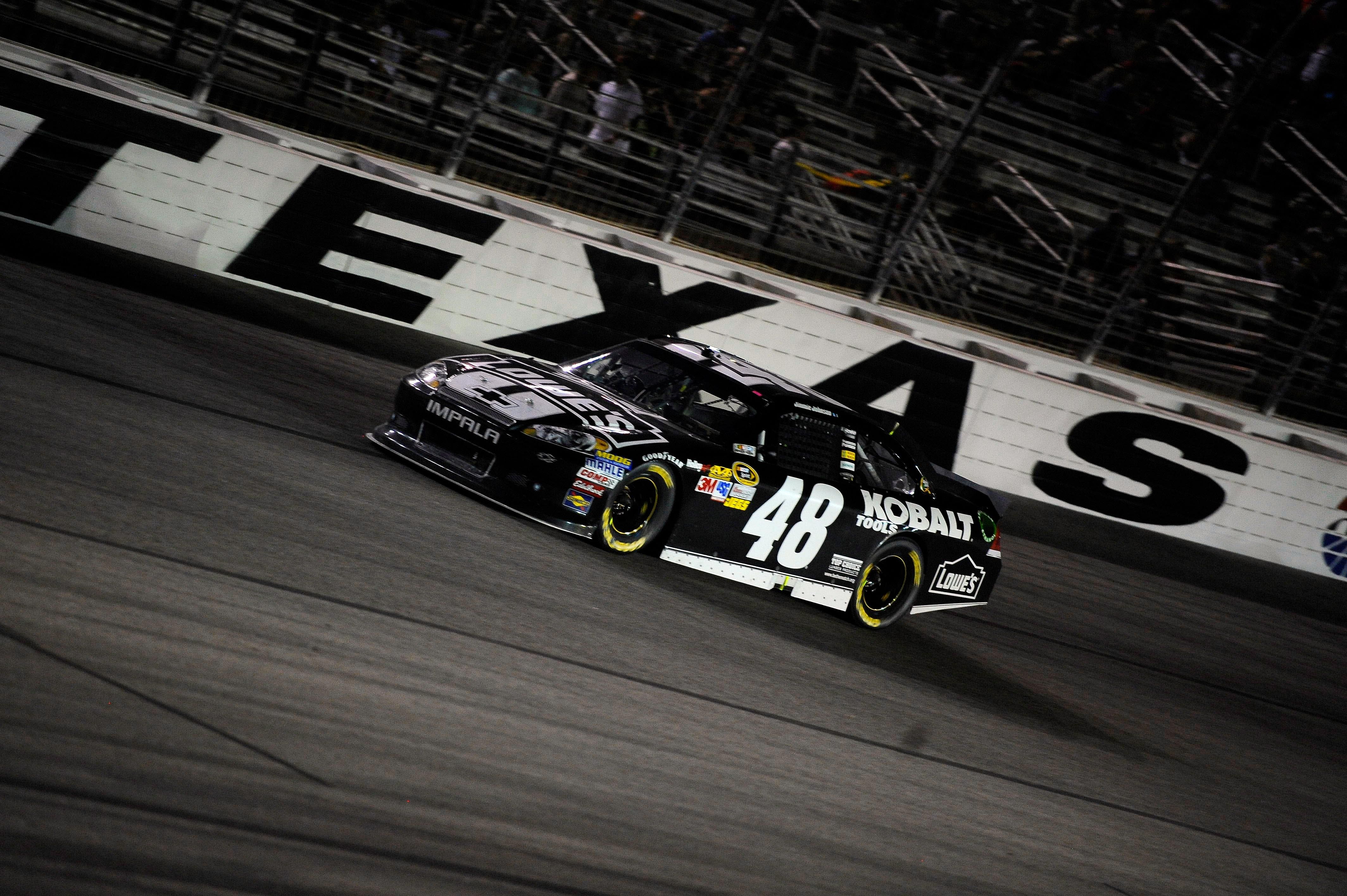 Jimmie Johnson (48) drives through turn four during the Samsung Mobile 500 at Texas Motor Speedway.  - Source: Imagn