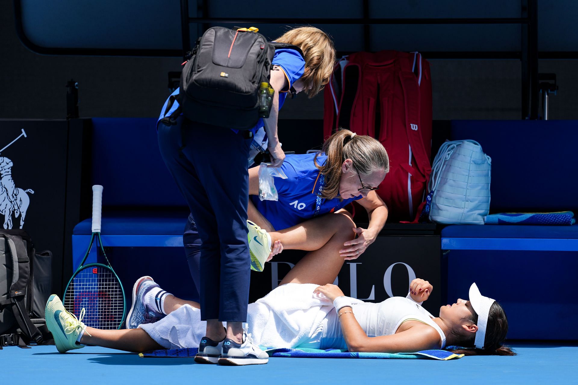 Emma Raducanu gets medical attention during the match against Amanda Anisimova at the 2025 Australian Open. Source: Getty