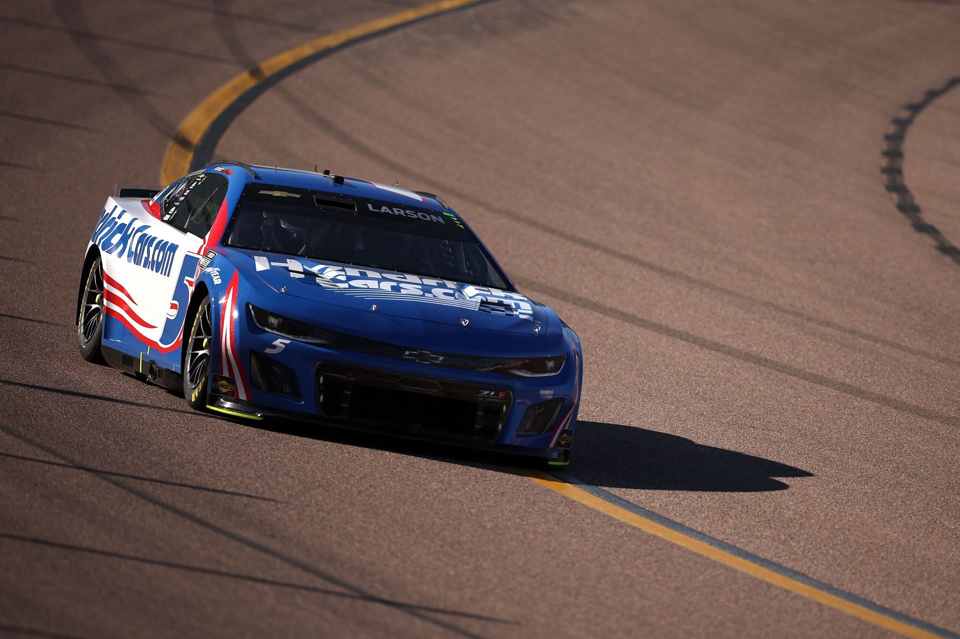 Kyle Larson, driver of the #5 HendrickCars.com Chevrolet, drives during the NASCAR Cup Series Championship Race at Phoenix Raceway - Source: Getty