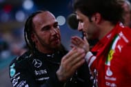 Lewis Hamilton talks with Carlos Sainz in Parc Ferme during the Abu Dhabi Grand Prix - Source: Getty
