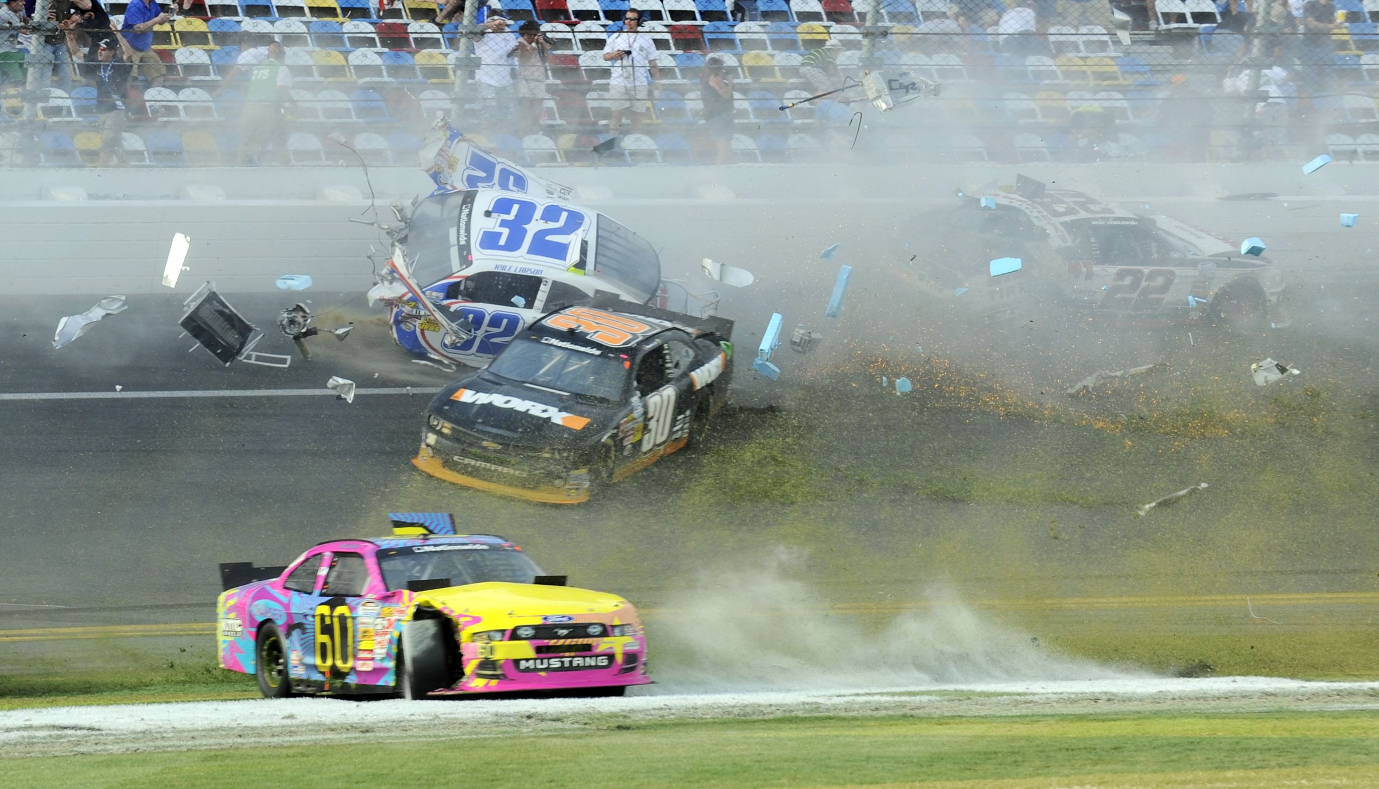 Kyle Larson, Travis Pastrana, Nelson Piquet Jr and Brad Keselowski are involved in a final lap crash during the DRIVE4COPD 300 at Daytona International Speedway - Source: Imagn