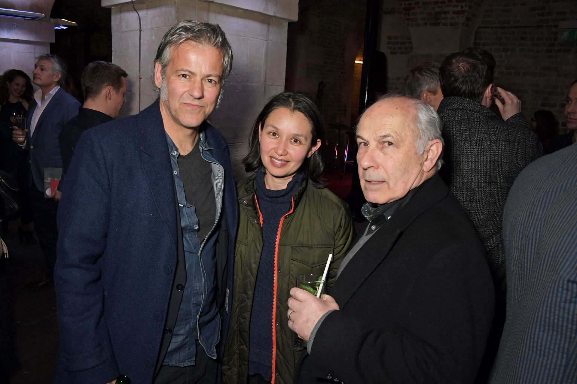 (L to R) Rupert Graves, Susie Lewis and Nicholas Woodeson attend the press night after party for &quot;Betrayal&quot; at The Cafe In The Crypt in March 2019 (Image via Getty)