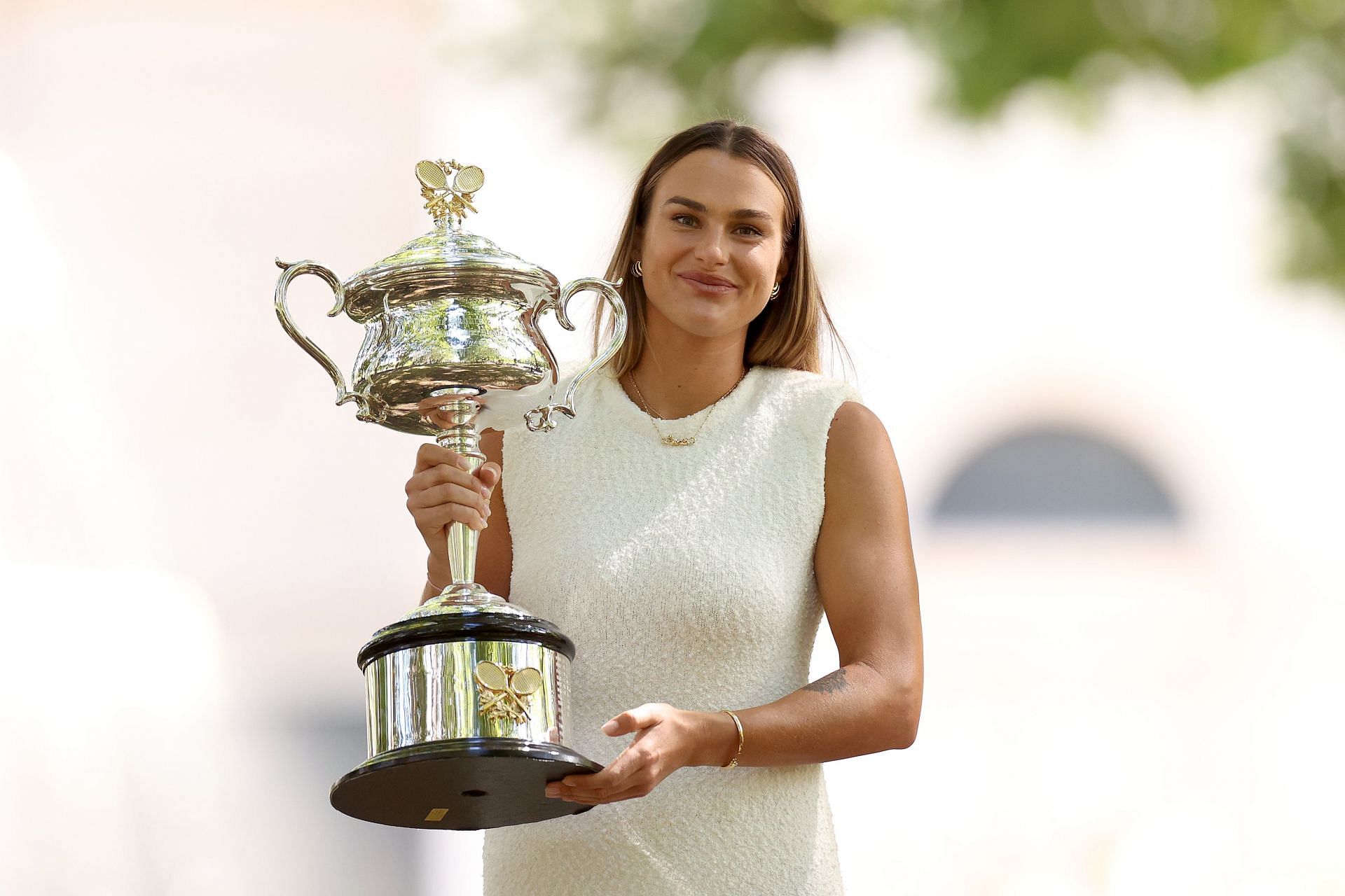 Aryna Sabalenla with the 2024 Australian Open Women&#039;s Trophy [Image Source: Getty)