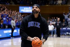 Carlos Boozer shares his reaction to the release of twins Cayden and Cameron Boozer's autographed trading cards