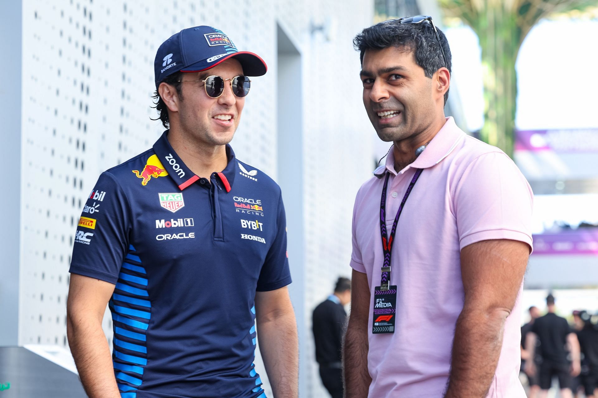 Sergio Perez with Karun Chandhok - F1 Grand Prix of Saudi Arabia - Practice - Source: Getty