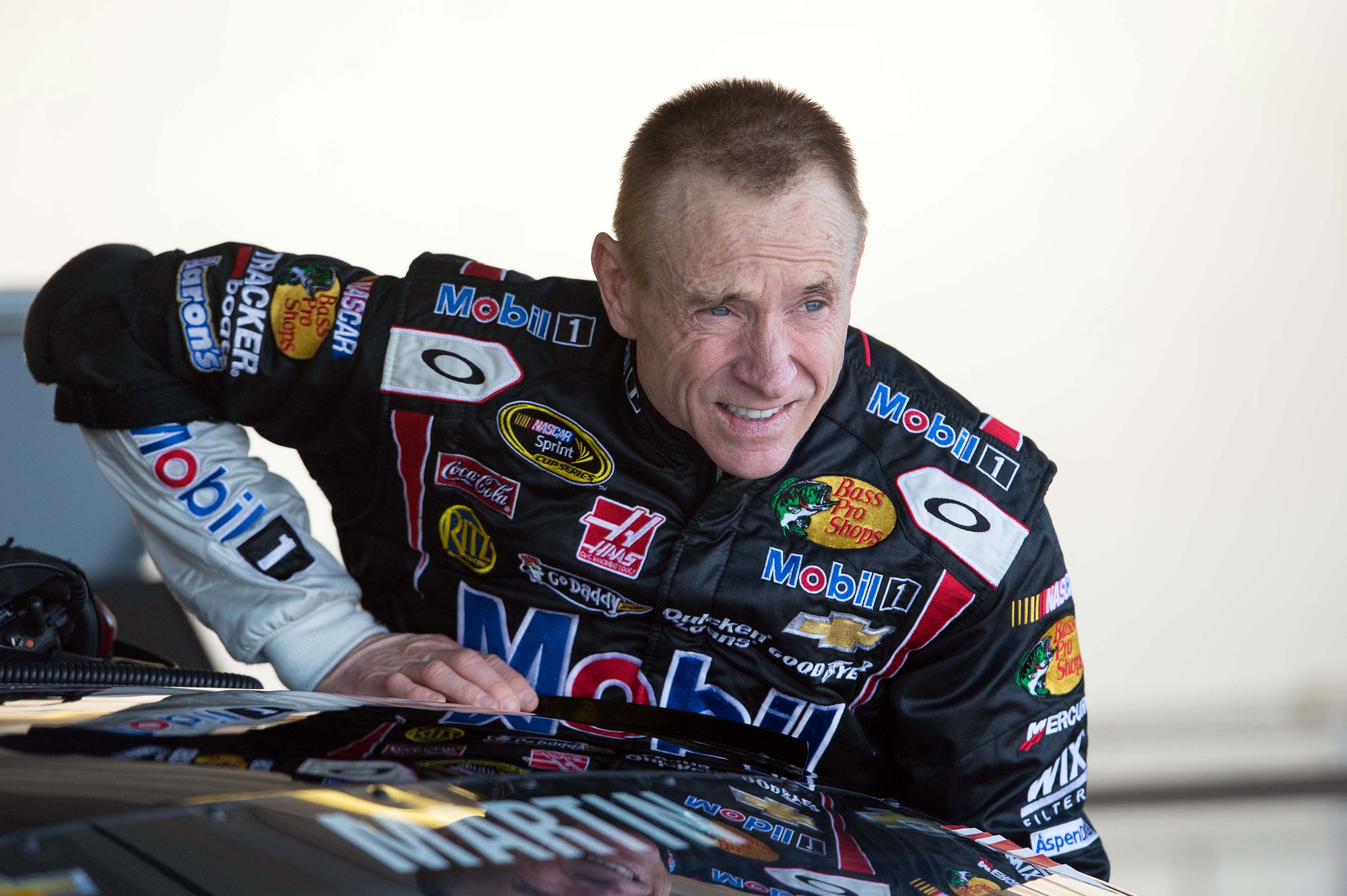 Nov 9, 2013; Avondale, AZ, USA; NASCAR Sprint Cup Series driver Mark Martin (14) during practice for the Advocare 500 at Phoenix International Raceway. Mandatory Credit: Jerome Miron-Imagn Images - Source: Imagn