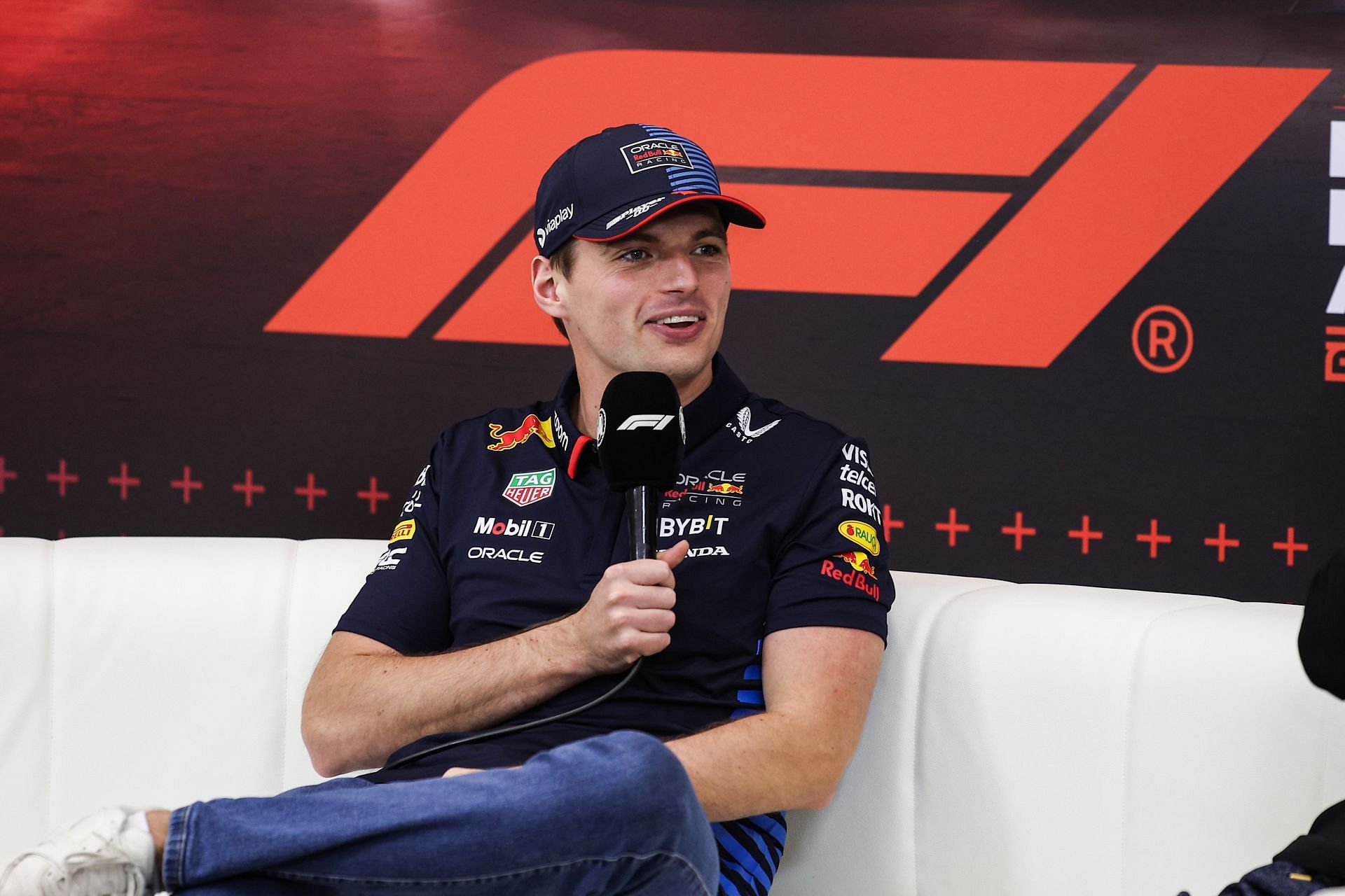 Max Verstappen of Red Bull Racing RB20 poses for a portrait - Source: Getty