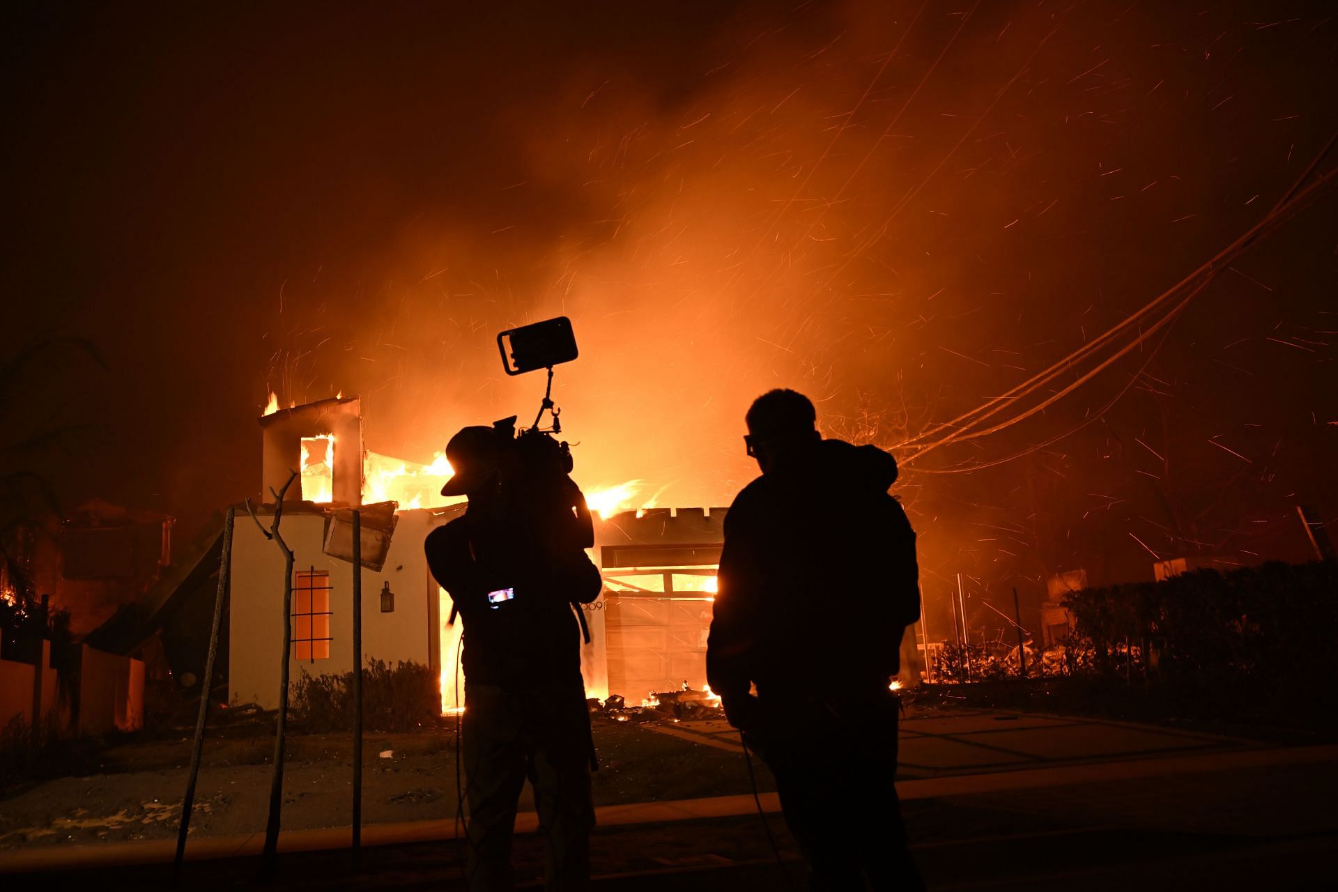 Wildfires tear through Los Angeles - Source: Getty