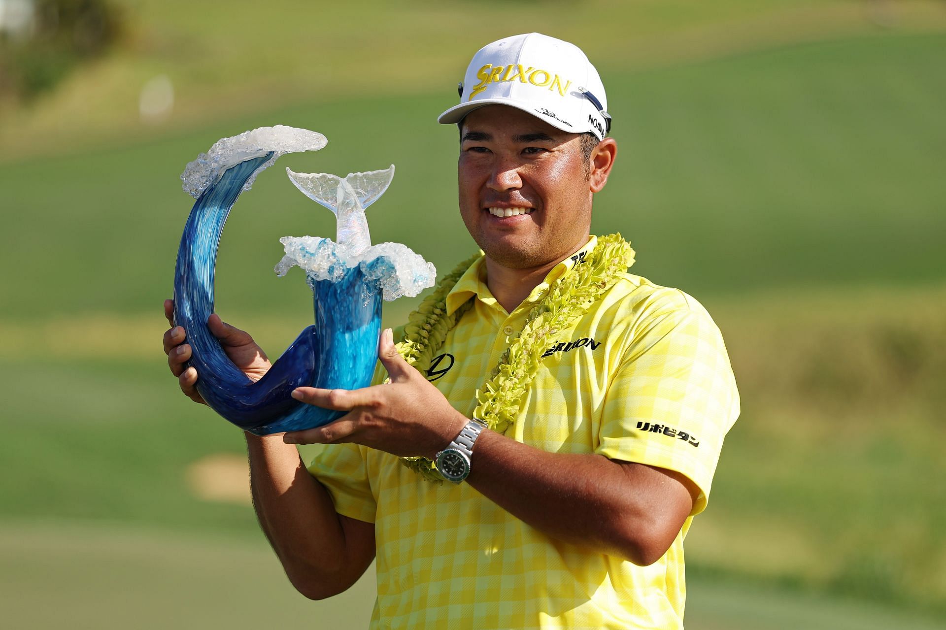 Hideki Matsuyama poses with the trophy after winning The Sentry 2025 at Plantation Course at Kapalua Golf Club. (Image Source: Getty)