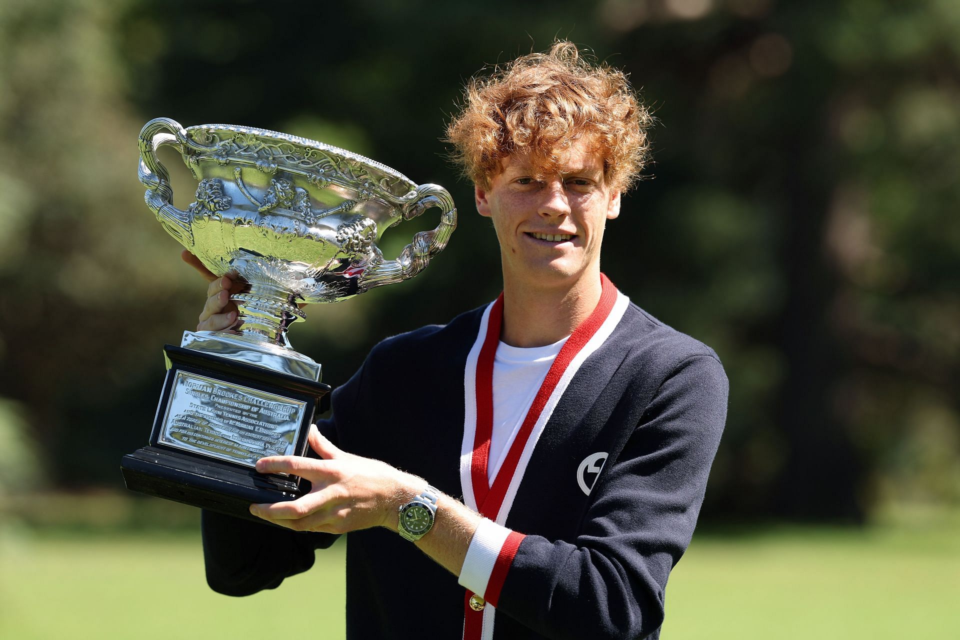 Jannik Sinner poses with the 2024 Australian Open title | Getty Images