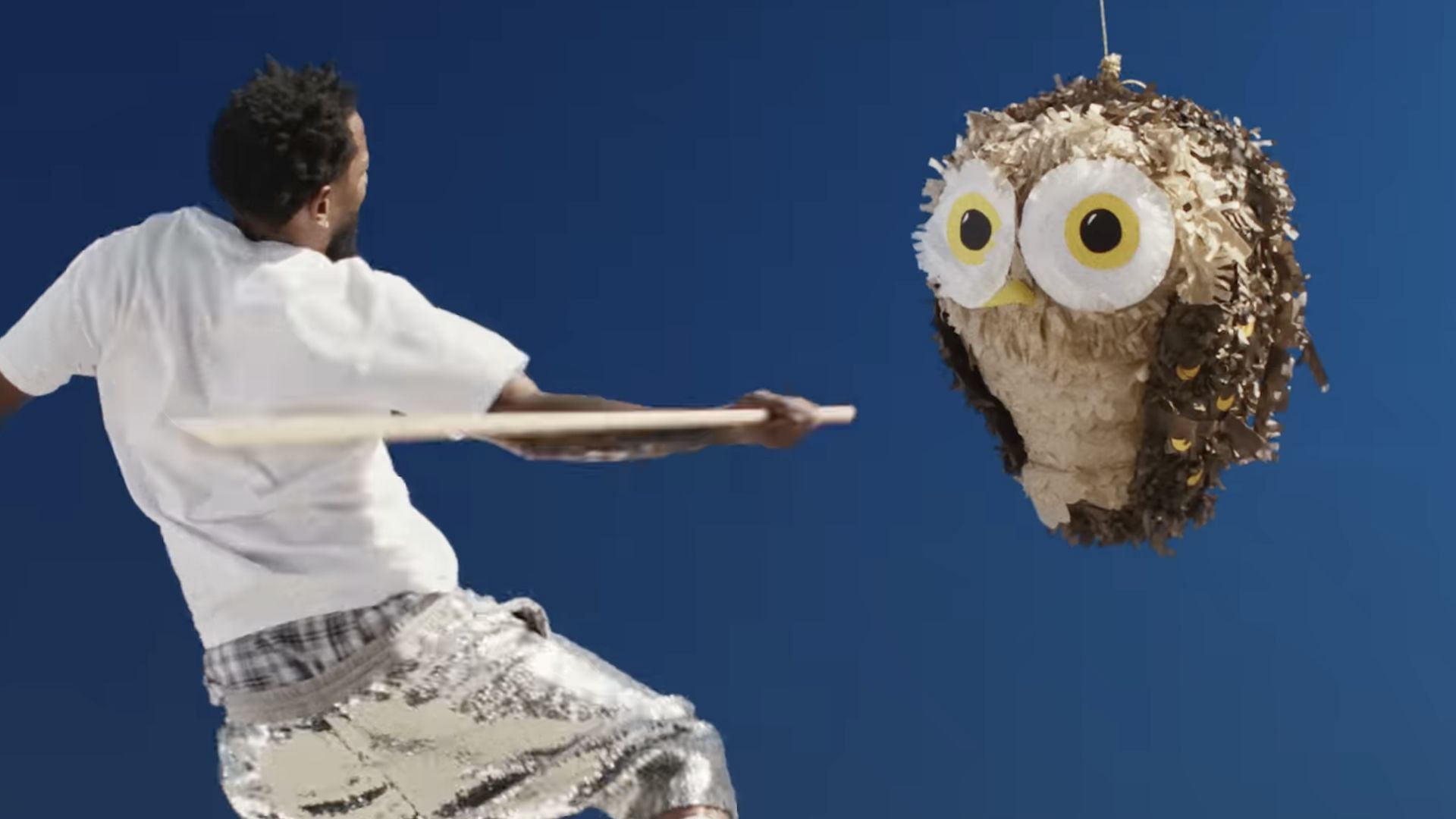 Kendrick Lamar beating up an &quot;Owl Pi&ntilde;ata&quot; in the &#039;Not Like Us&#039; music video (Image via YouTube/@kendricklamar)