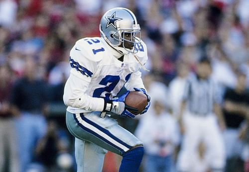 Dallas Cowboys punt returner Deion Sanders (21) runs with the ball against the San Francisco 49ers. (Credits: IMAGN)