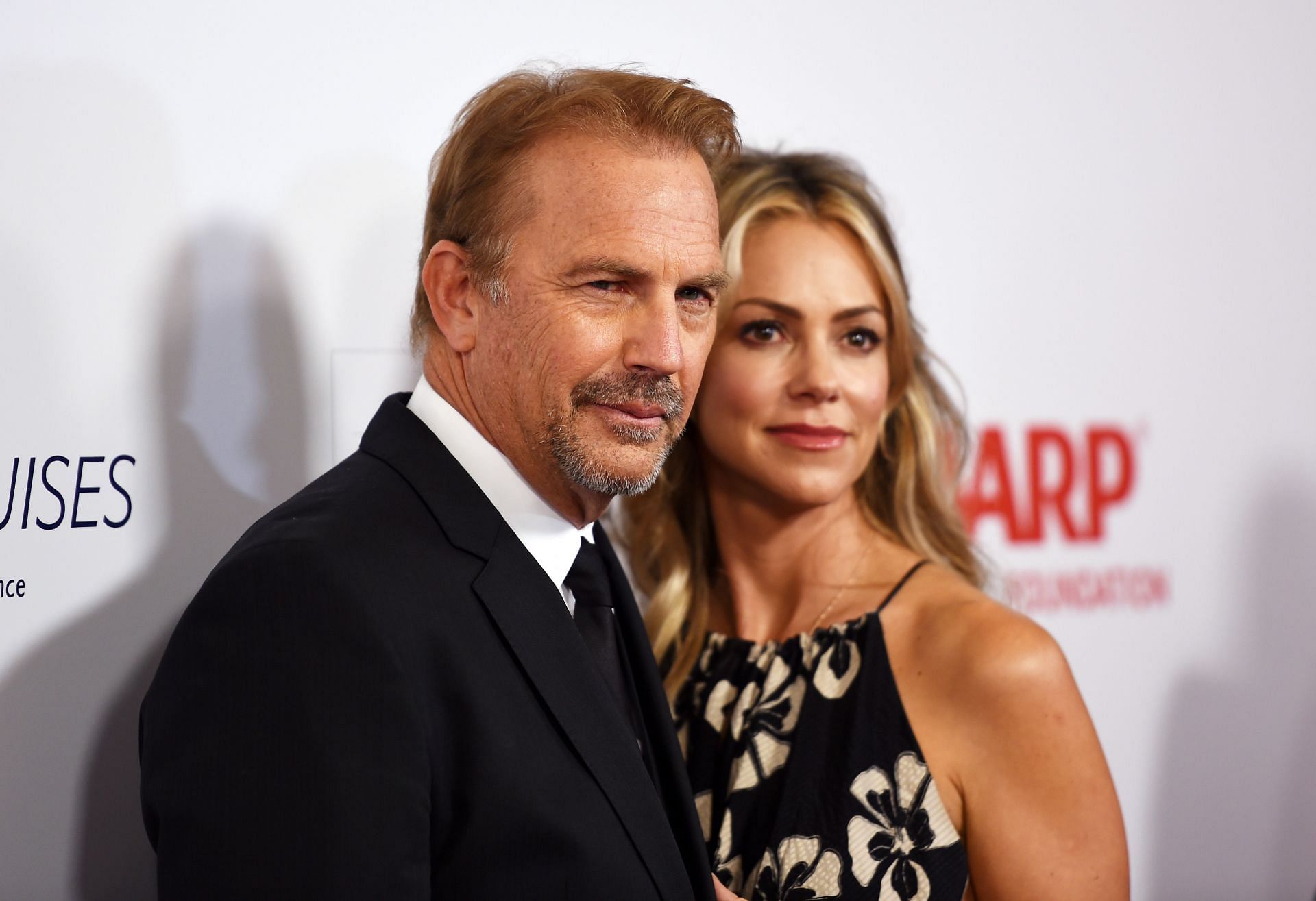 Kevin Costner and Christine Baumgartner (Image via Getty)