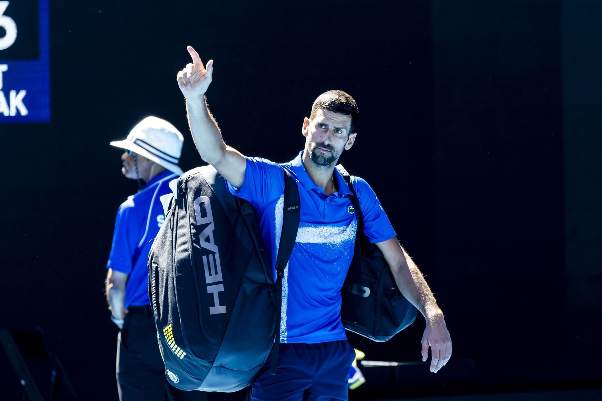 Novak Djokovic waves to the crowd after his 2025 Australian Open retirement. (Source: Getty)