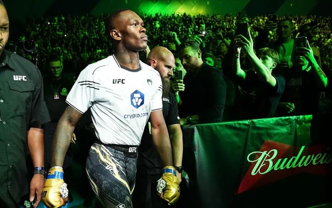 Israel Adesanya shares two-word reaction to popular stuntman's viral cliff jumping clip