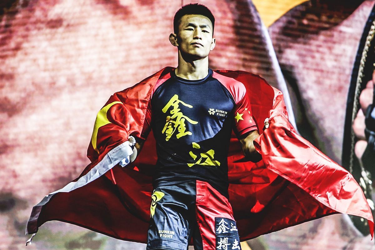 (Pictured) ONE featherweight MMA world champion Tang Kai.