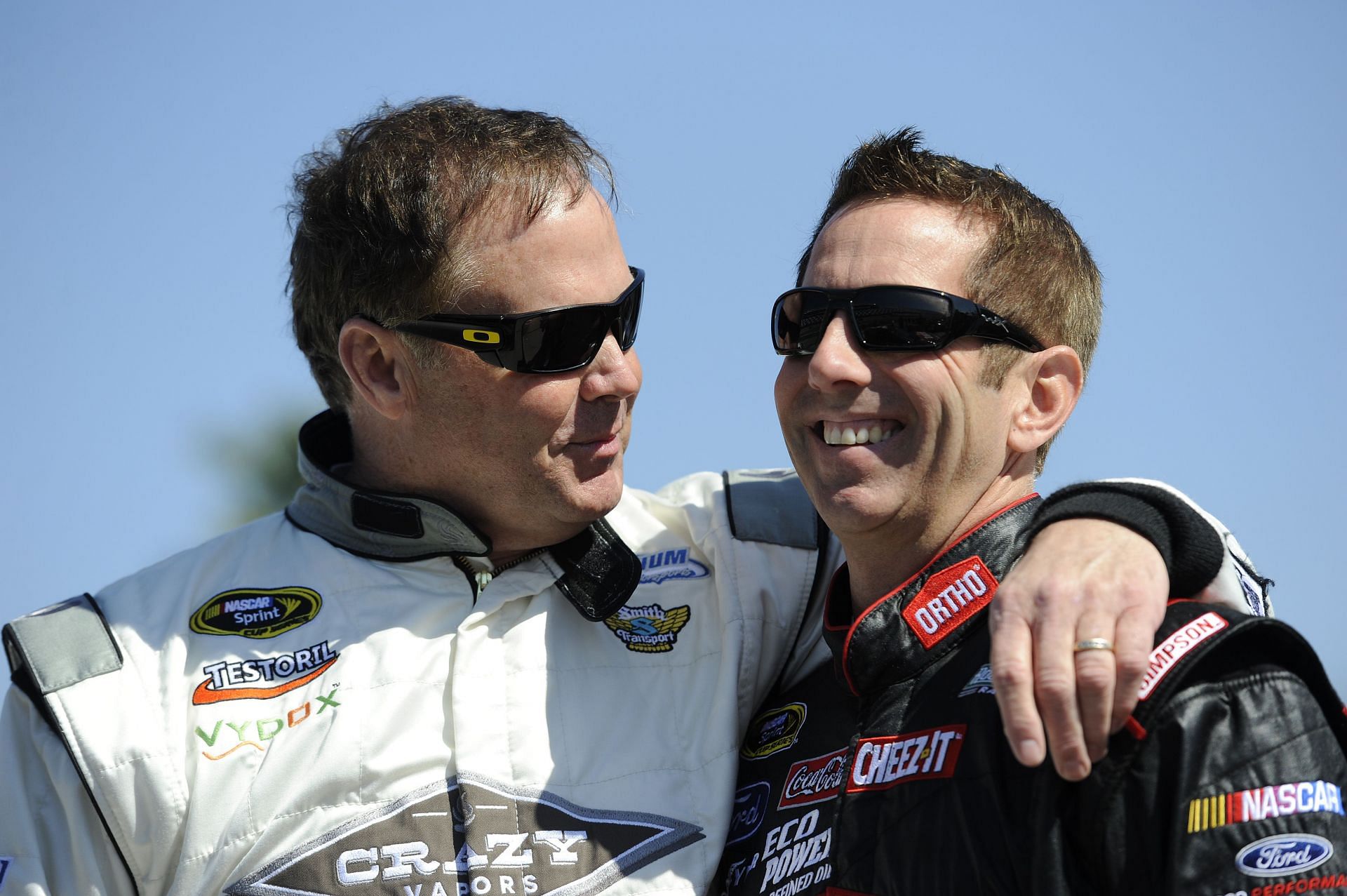 Mike Wallace talks to Greg Biffle on the grid during qualifying for the 2015 Daytona 500 - Source: Getty