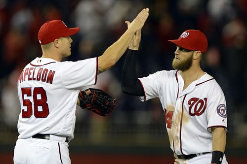 Former Washington Nationals - Jonathan Papelbon and Bryce Harper (Photo via IMAGN)