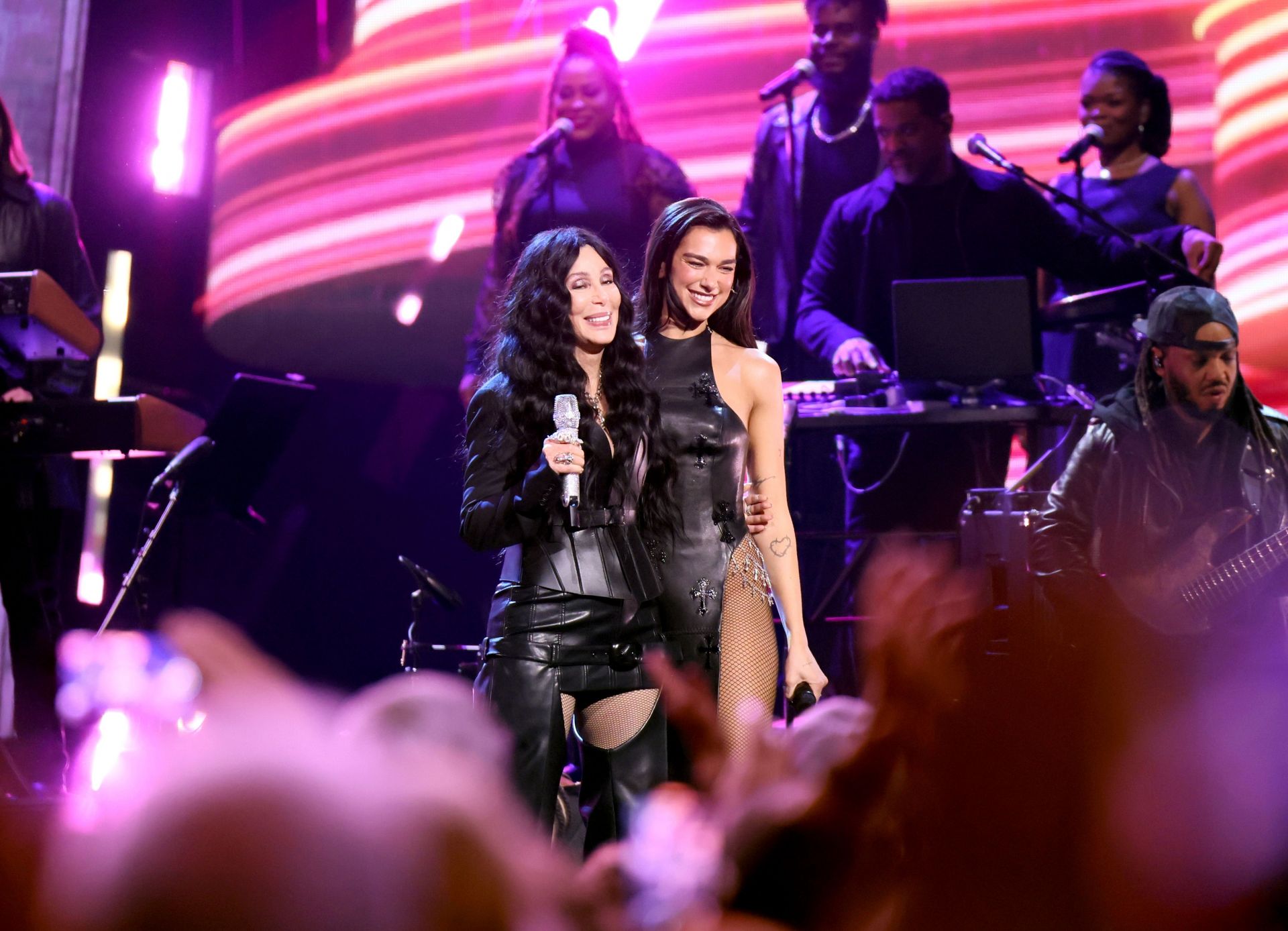 Performing with Cher (Image via Dia Dipasupil/Getty Images)