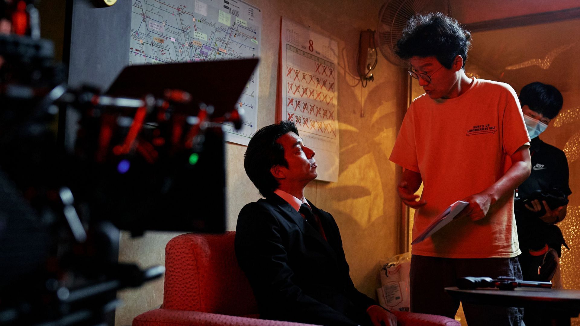 Squid Game 2 director Hwang Dong-hyuk and Gong Yoo in behind-the-scenes. (Image via X/@NetflixKR)