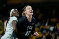 TCU Horned Frogs center Sedona Prince (13) and UCF Knights forward Adeang Ring (22) position themselves for a rebound during their game on December 21, 2024 at Addition Financial Arena in Orlando, Florida. Photo: Getty