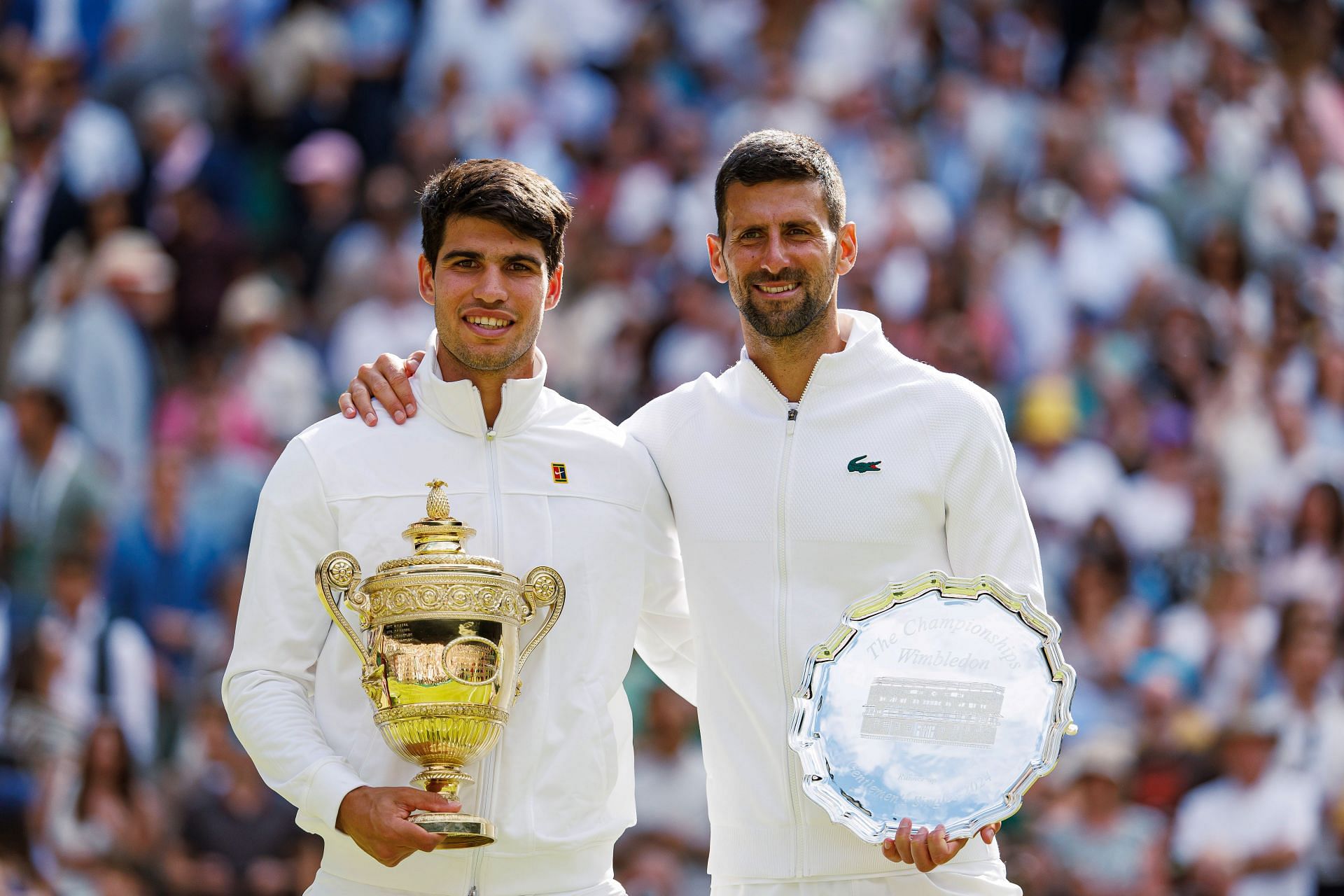 Carlos Alcaraz (L) and Novak Djokovic on Day Fourteen: The Championships - Wimbledon 2024 - Source: Getty