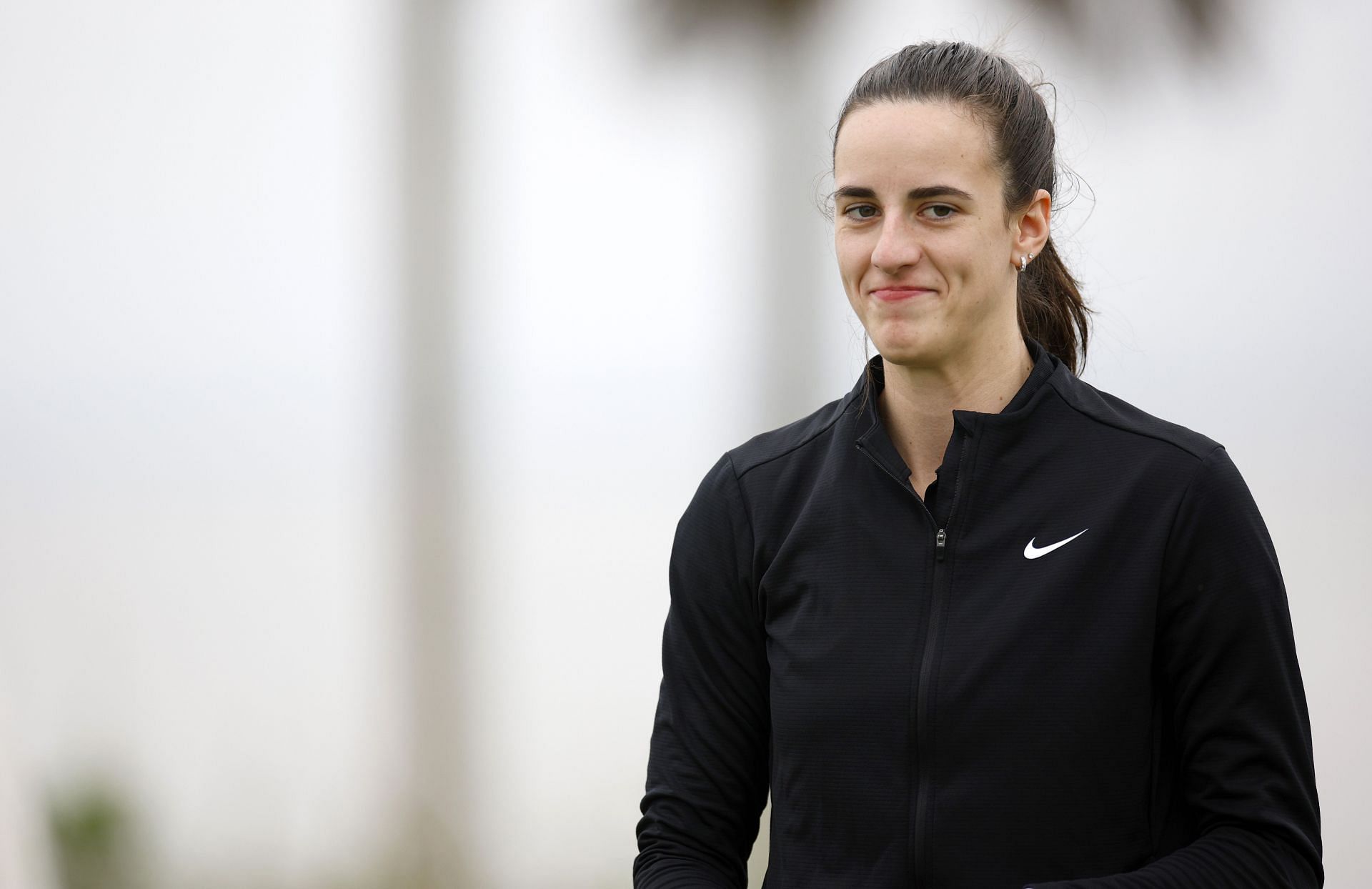 Fans buzz over Caitlin Clark heartfelt moment with young fan. -- Photo by GETTY