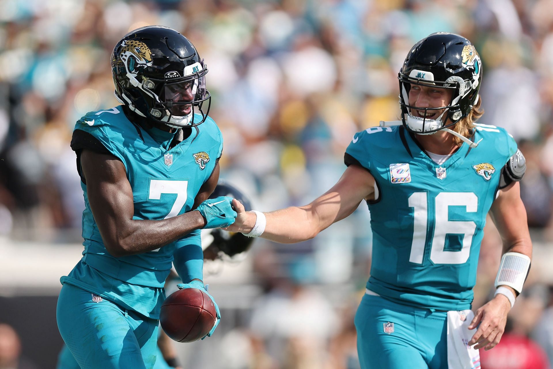 Brian Thomas Jr., left, Trevor Lawrence, right, during Green Bay Packers v Jacksonville Jaguars - Source: Getty