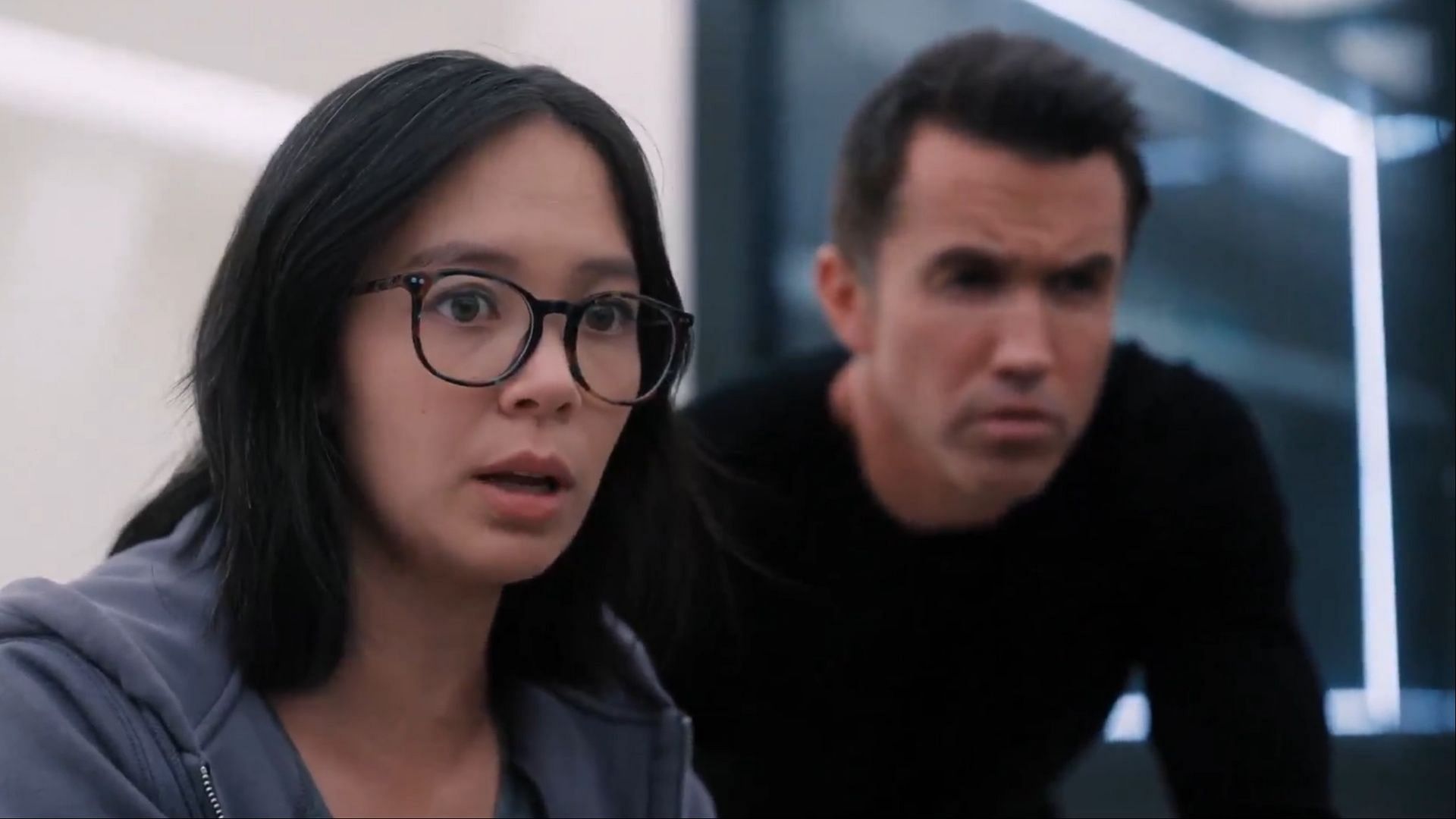 Ian and Poppy confront their creative differences: Ian Grimm (Rob McElhenney) and Poppy Li (Charlotte Nicdao) face challenges in their collaboration at GrimPop Studios as they work on their new game, Hera in Mythic Quest season 3 ( via AppleTv+)