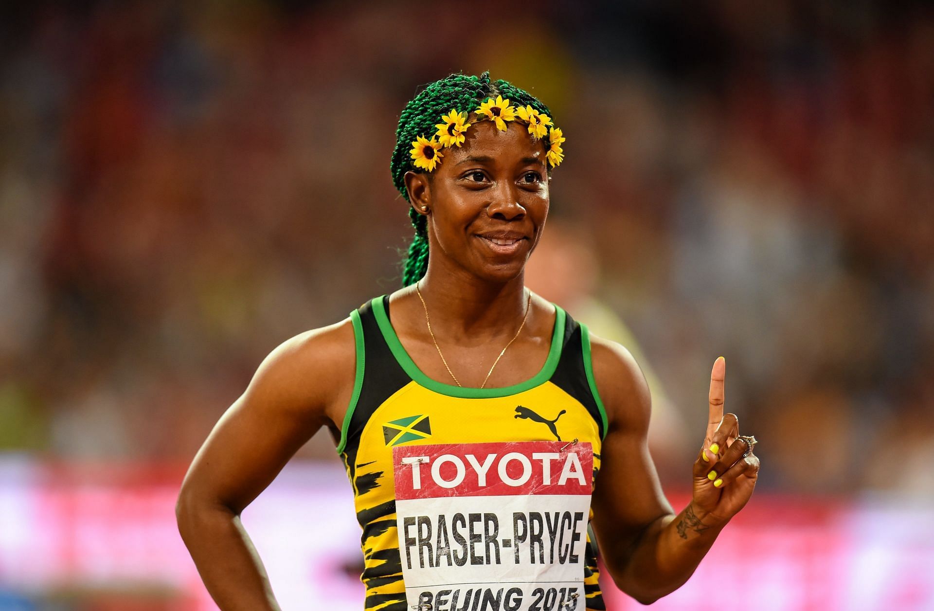 Shelly-Ann Fraser-Pryce after winning the Women&#039;s 100m finals at the IAAF World Championships in Beijing (Image via: Getty Images)