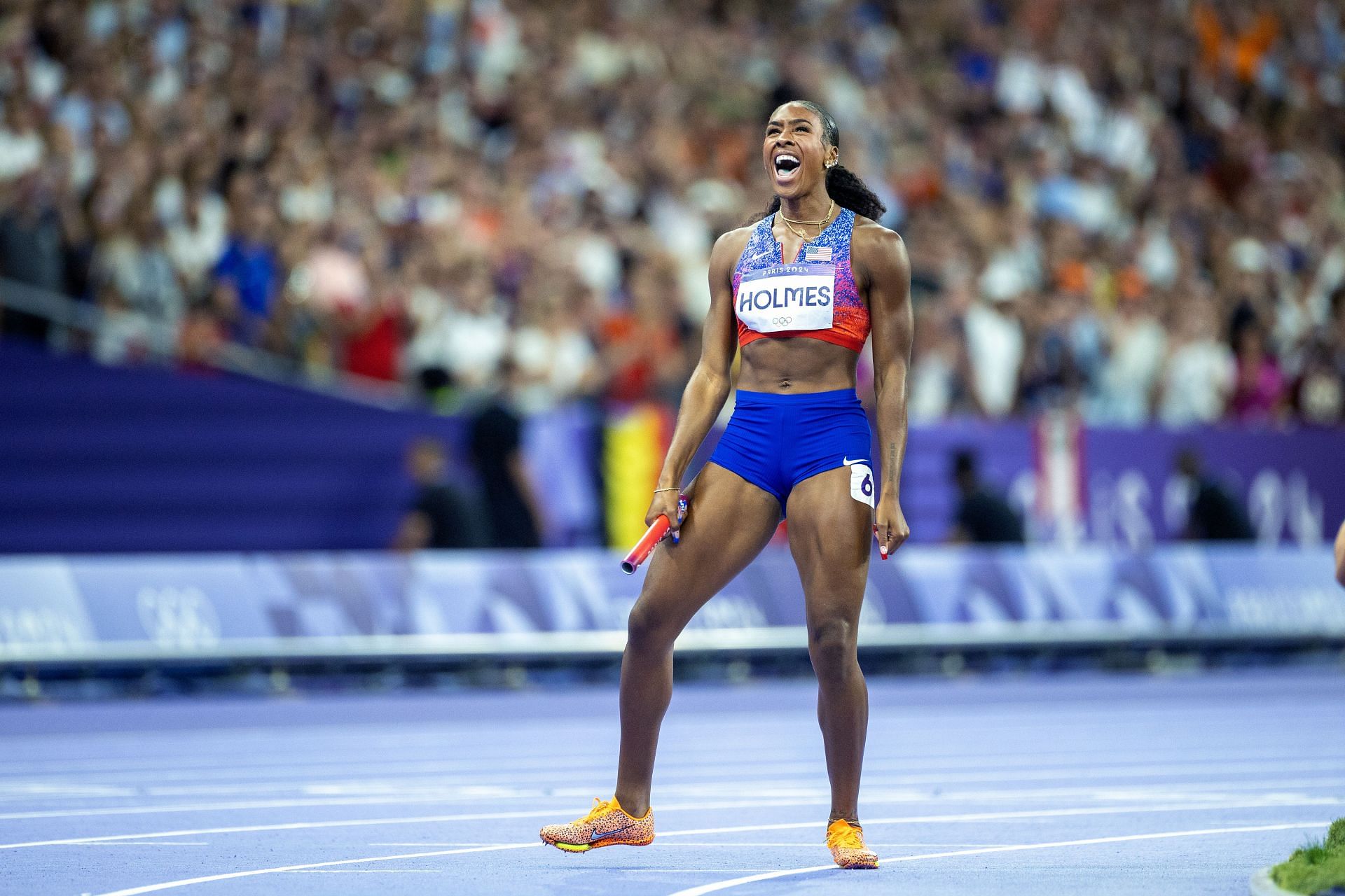 Holmes celebrating after taking her team to gold medal finish in the Women&#039;s 4x400m relays during the 2024 Paris Olympics (Image via: Getty Images)