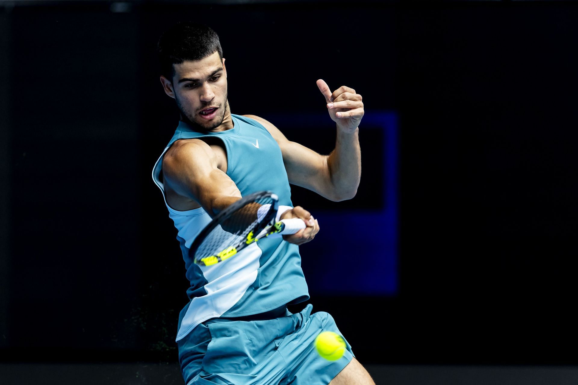 Carlos Alcaraz hits a forehand during his second-round match against Yoshihito Nishioka at the 2025 Australian Open (Source: Getty)