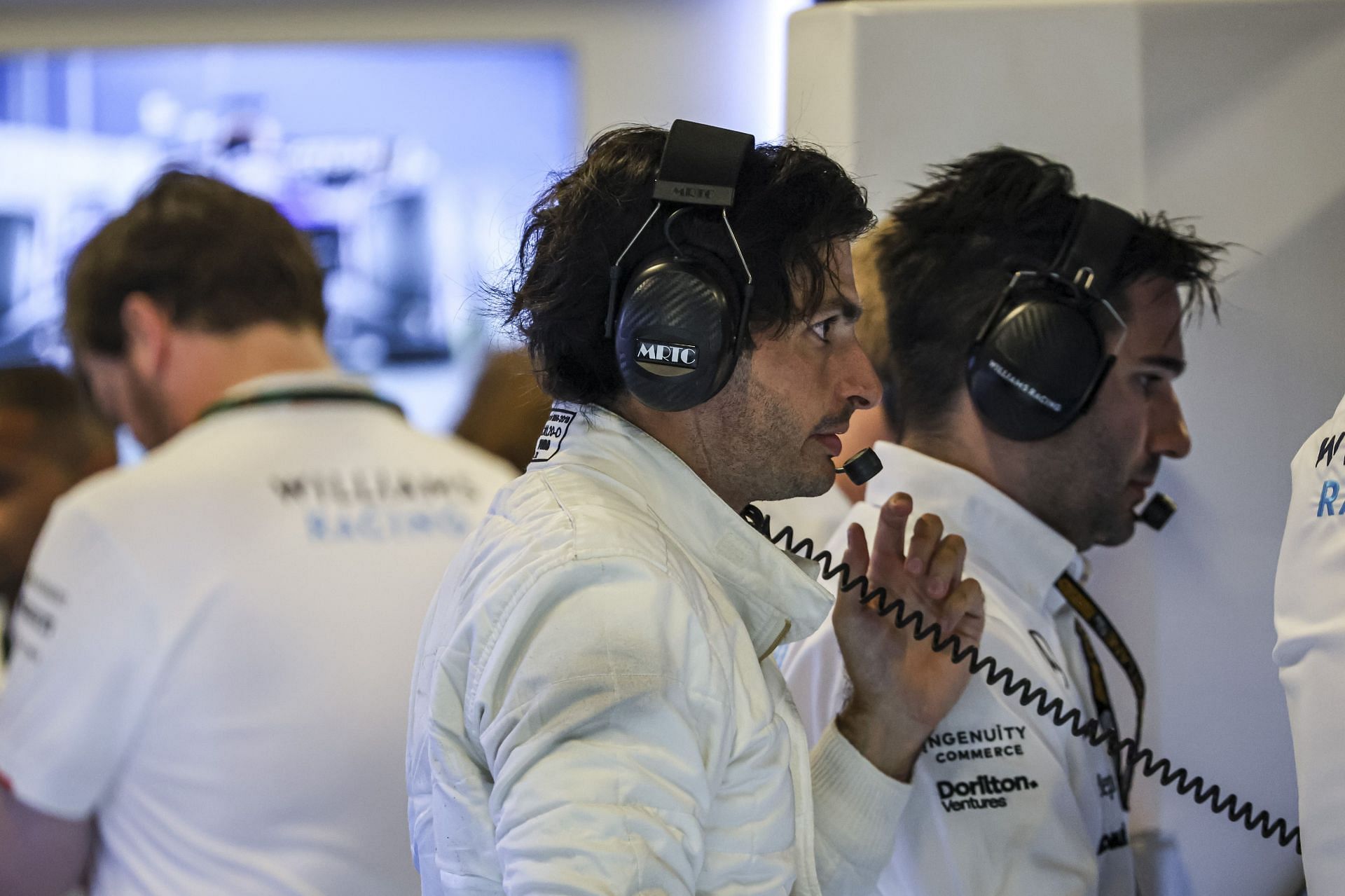 Carlos Sainz of Spain spotted with his new team Williams in the pit. Sainz, driver of Williams Racing Formula One Team with the FW46 F1 race car no 55, spotted in the pit with a white track suit and helmet during post-season test day at the YAS circuit, after the F1 Grand Prix of Abu Dhabi at Yas Marina Circuit, Abu Dhabi, United Arab Emirates on December 10, 2024 (Photo by Nicolas Economou/NurPhoto via Getty Images) - Source: Getty