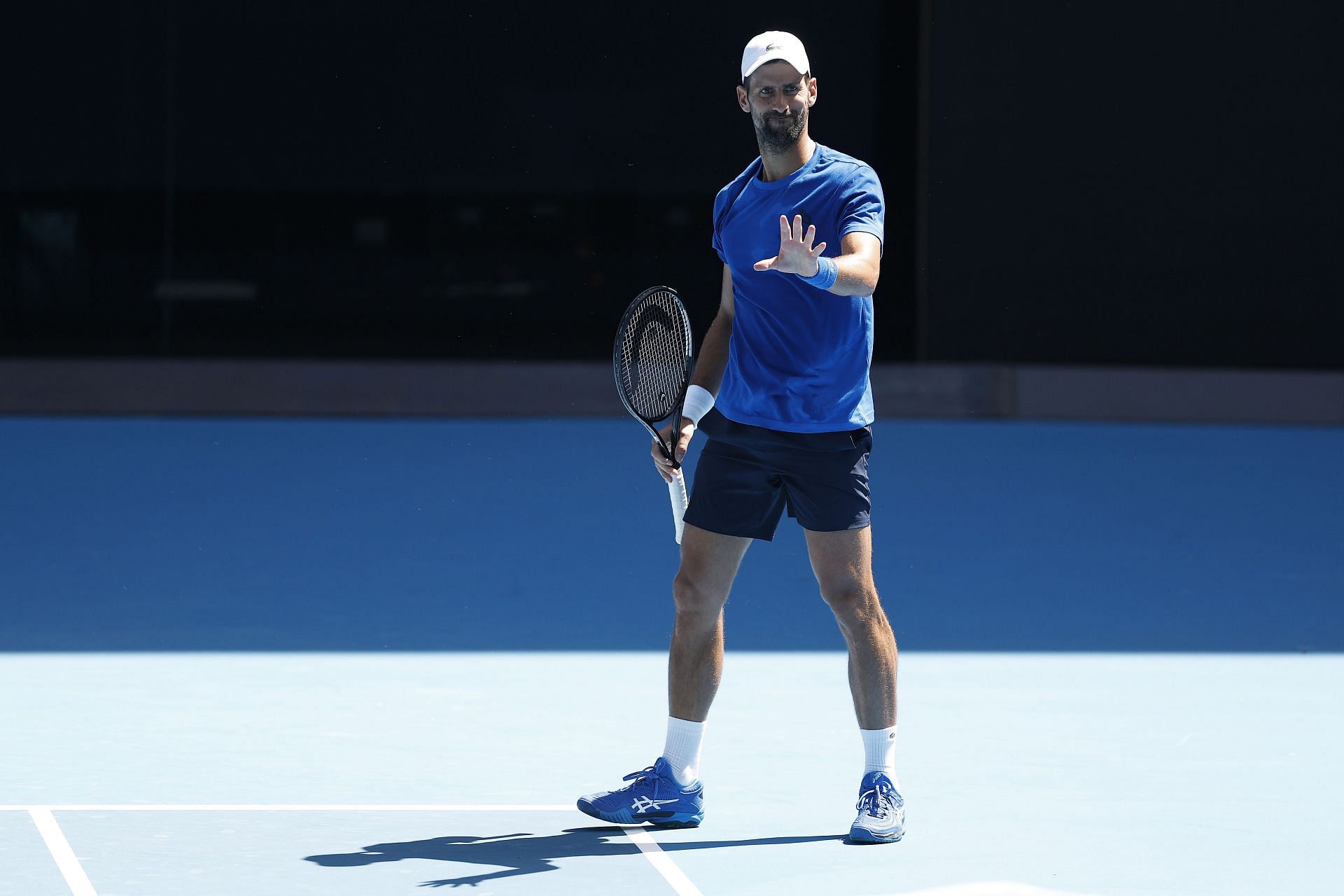 Novak Djokovic looks on during a practice session at Rod Laver Arena | Image Source: Getty