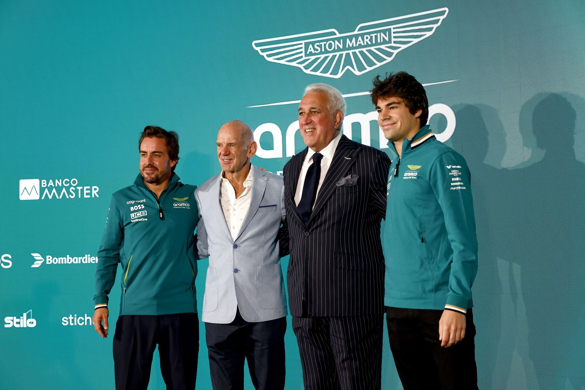 Fernando Alonso, Adrian Newey, Lawrence Stroll, and Lance Stroll, at a press conference at Aston Martin Headquarters - Source: Getty