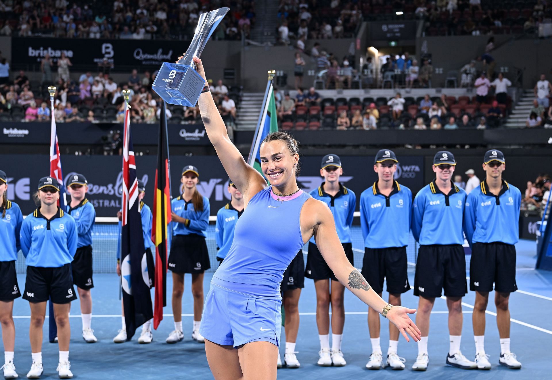 Aryna Sabalenka poses with the trophy at the 2025 Brisbane International. Image: Getty