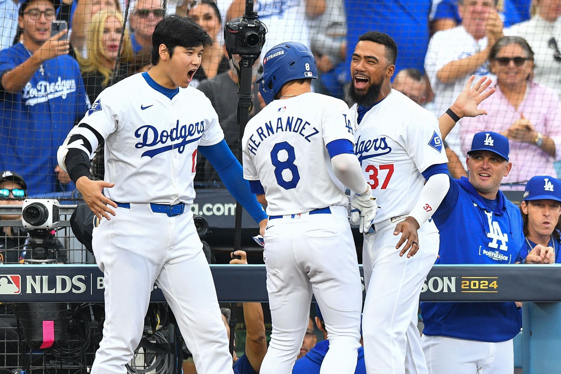 LOS ANGELES, CA - OCTOBER 11: Los Angeles Dodgers second baseman Enrique Hernandez (8) celebrates with Los Angeles Dodgers designated hitter Shohei Ohtani (17) and Los Angeles Dodgers left fielder Teoscar Hernandez (37) after he hit a solo home run during game five of the National League Division Series game between the San Diego Padres and the Los Angeles Dodgers on October 11, 2024 at Dodger Stadium in Los Angeles, CA. (Photo by Brian Rothmuller/Icon Sportswire via Getty Images) - Source: Getty