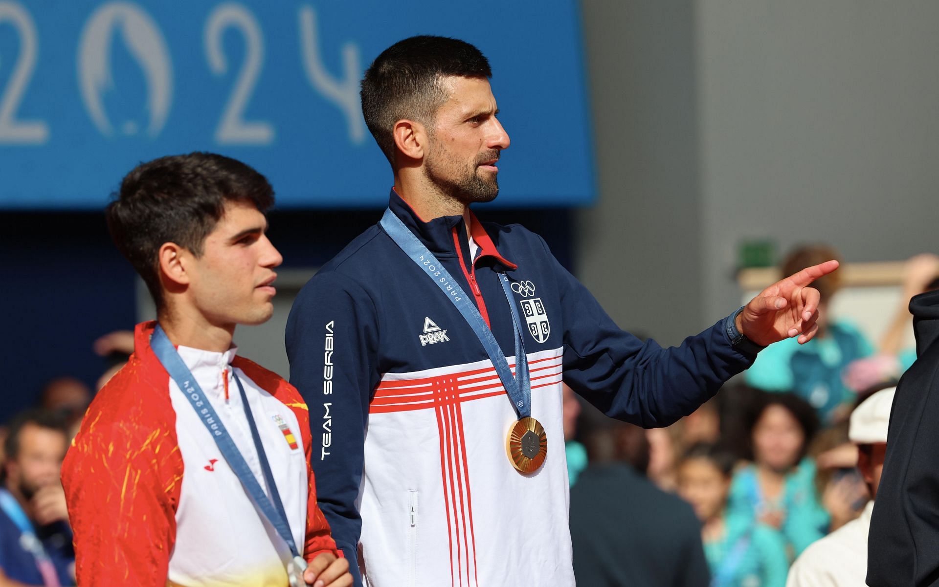 Victory ceremony with silver medal winner Carlo Alcaraz (L) of Spain, gold medal winner Novak Djokovic of Serbia on day nine of the Olympic Games Paris 2024 at Roland Garros- Source: Getty