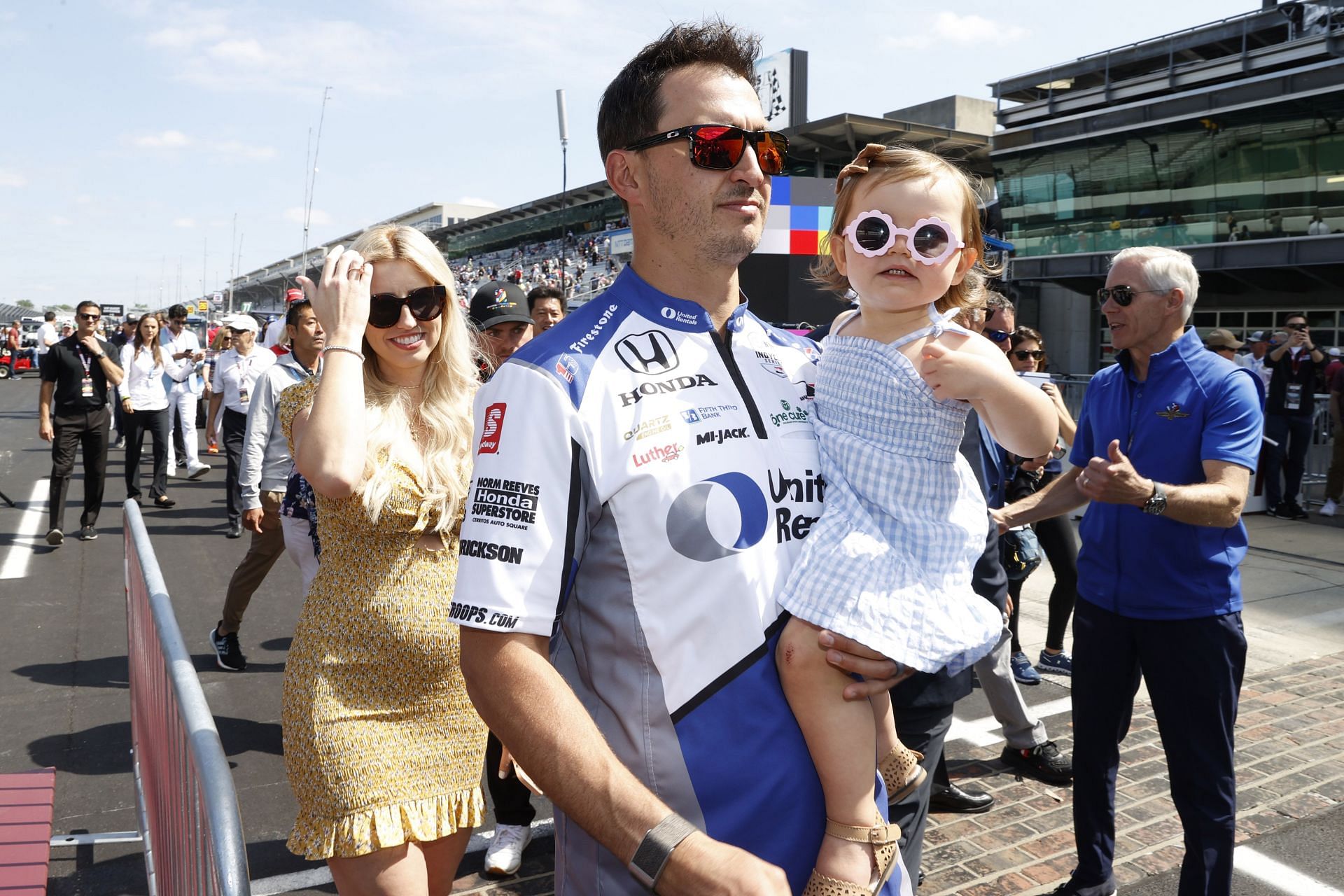 Graham Rahal, Courtney Force, and Harlan Ann Rahal at the 106th Indianapolis 500 Drivers Meeting - Source: Getty