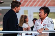 Haas F1 Team Principal Ayao Komatsu speaks with Romain Grosjean in the paddock during the F1 Grand Prix of Las Vegas - Source: Getty