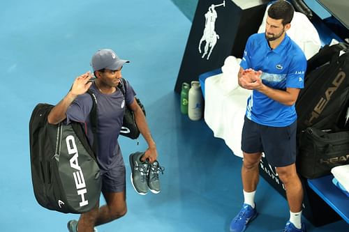 Novak Djokovic applauds Nishesh Basavareddy at the 2025 Australian Open. - Source: Getty