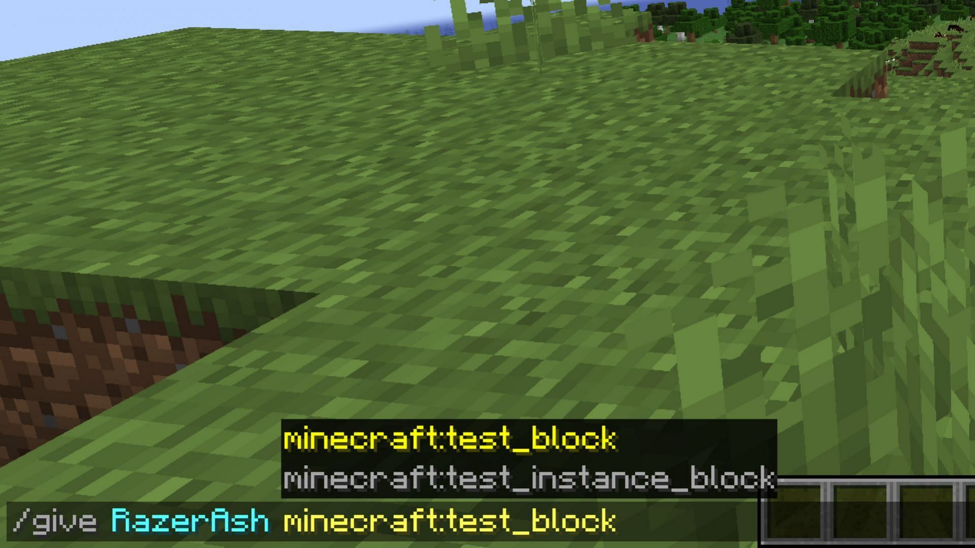 Get the test blocks by using the /give command (Image via Mojang Studios)