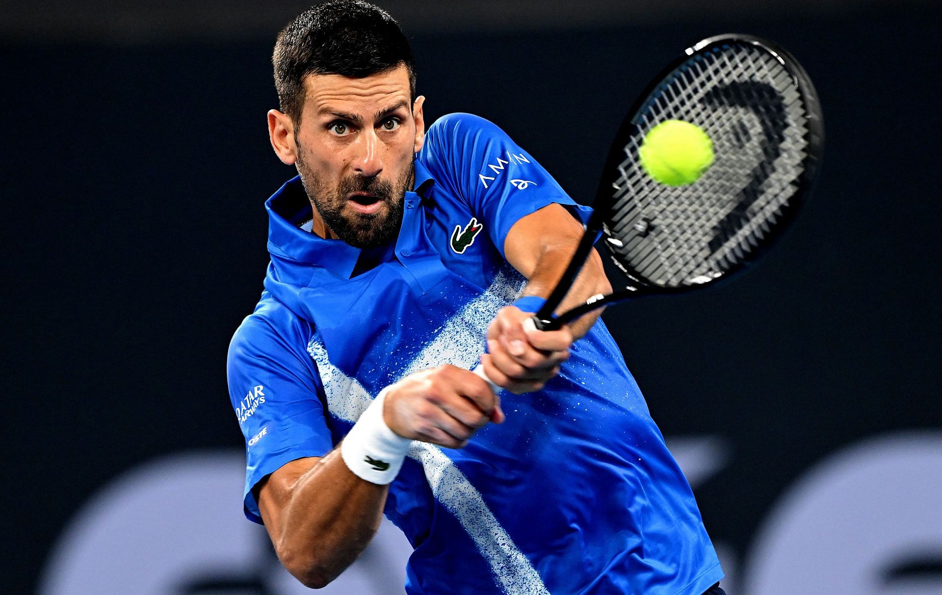 Novak Djokovic hits a backhand at Brisbane