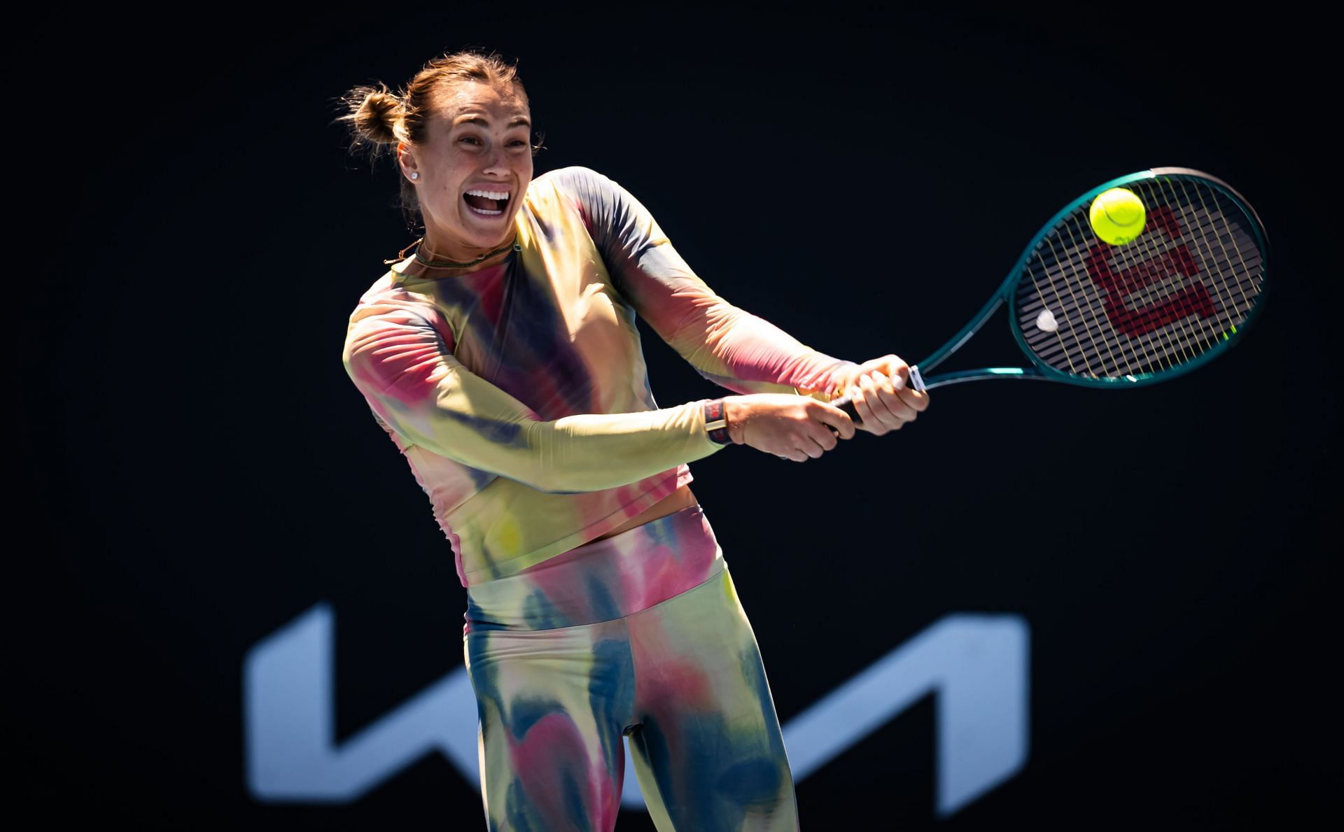 Aryna Sabalenka practicing at the 2025 Australian Open in her colorful, body-hugging outfit (Source: Getty)