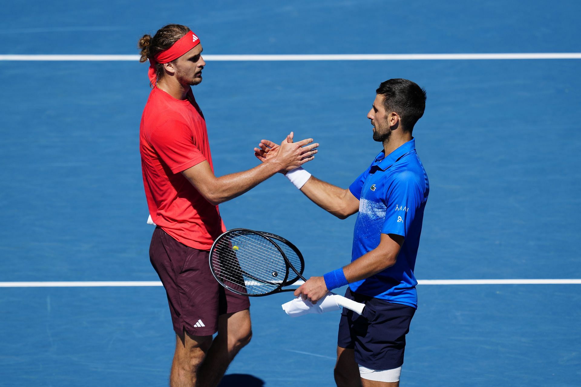 Zverev and Djokovic sharing a moment at the 2025 Australian Open - (Source: Getty)